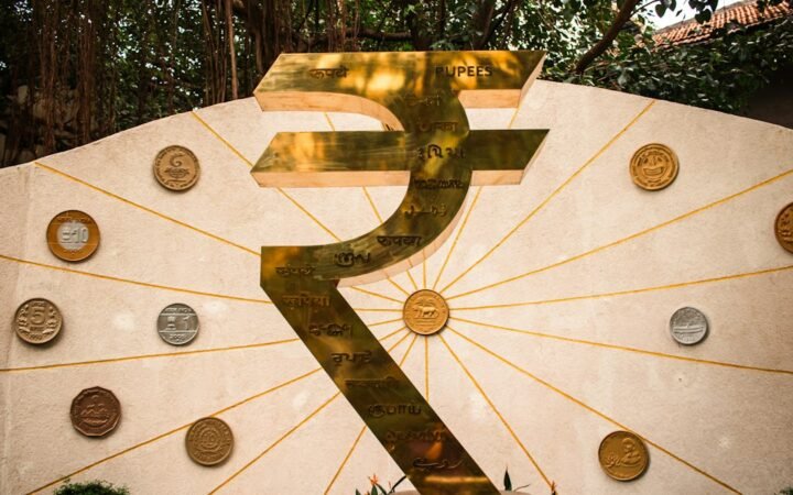 Indian rupee symbol और financial-market context को दर्शाती image