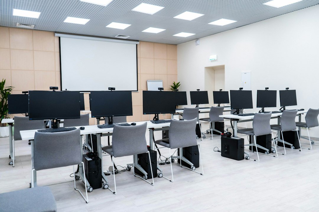 People developing future skills on computers illustrating workforce and AI skills research