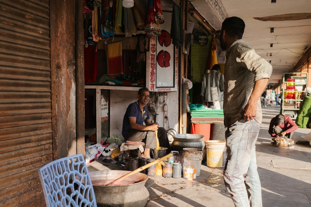 Small business entrepreneur with paperwork illustrating MSME Udyam registration and compliance