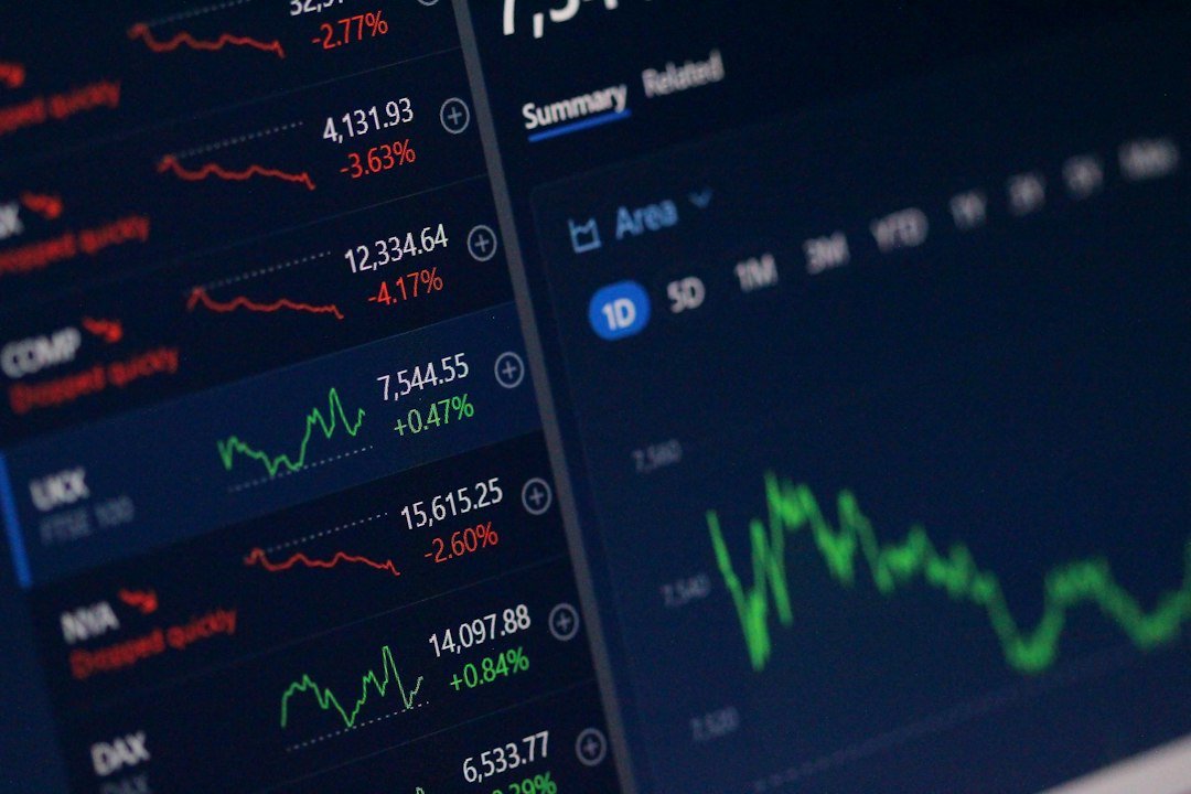 Computer showing stock market charts illustrating NSE SEBI T plus one and T plus zero settlement