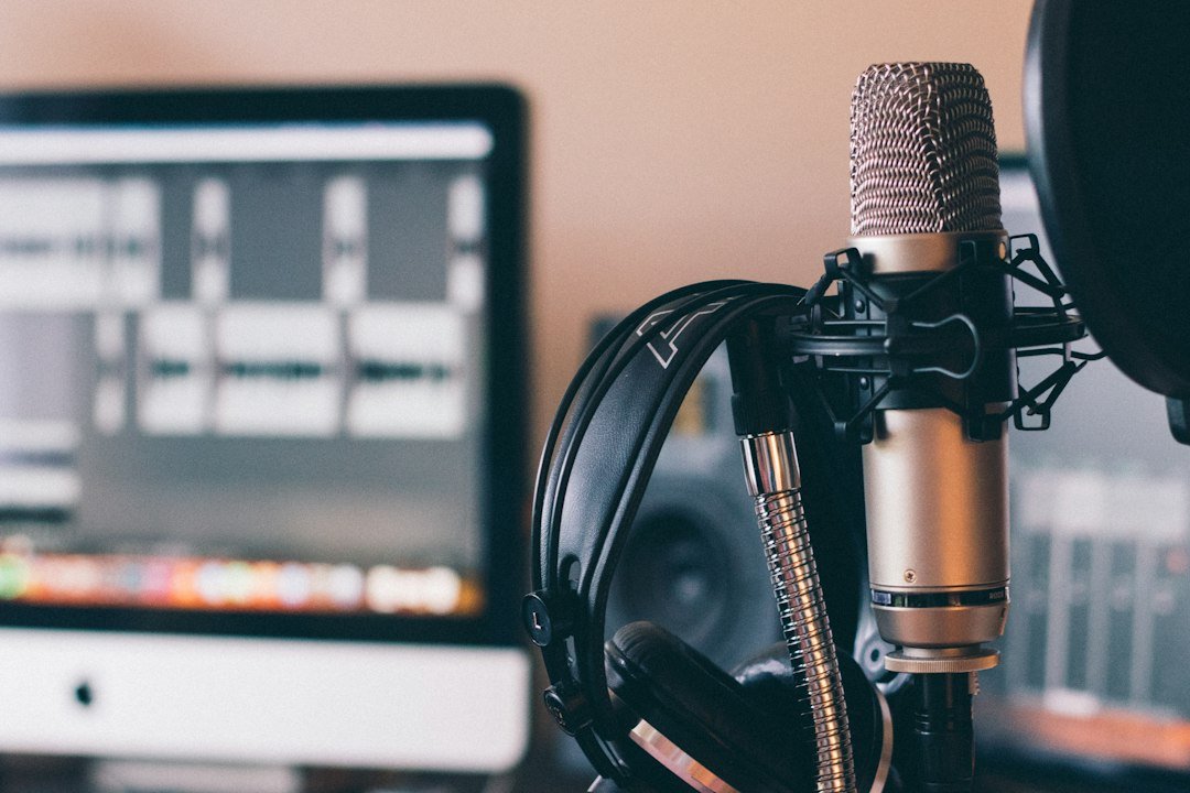 Podcast production microphone and headphones for planned small business AI episode script