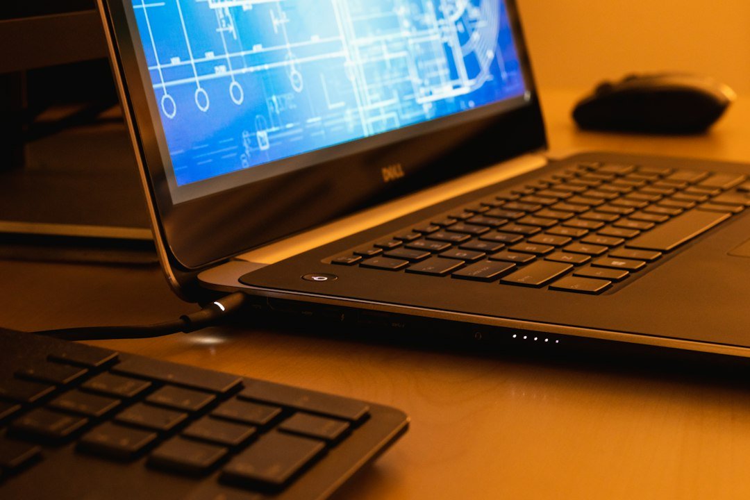Laptop showing technical visual diagrams representing testing and evaluation of AI agents