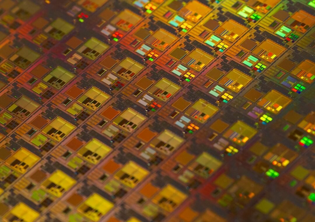 Silicon semiconductor wafer and chip manufacturing illustration for TSMC earnings analysis