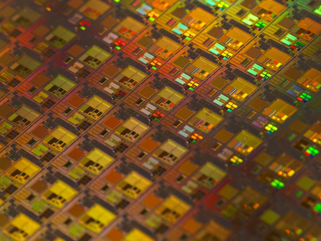 Silicon semiconductor wafer and chip manufacturing illustration for TSMC earnings analysis