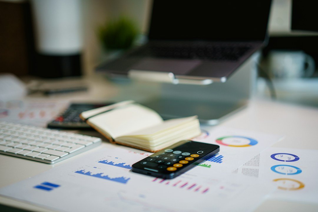 Finance calculator and investment reports illustrating credit risk analysis of corporate bonds and debt securities