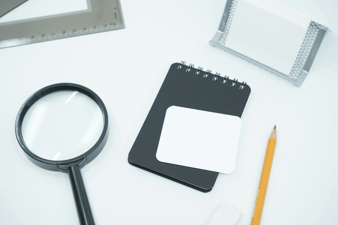 Magnifying glass over a paper document illustrating checking the authenticity of SEBI letter outward numbers; editorial conceptual image