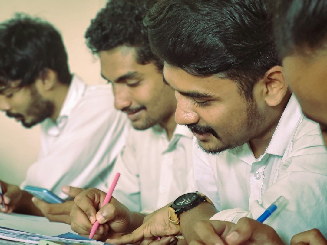 Indian students taking notes in a classroom, illustrating securities-market financial education under SEBI Project Jagrook MUST; illustrative stock photo