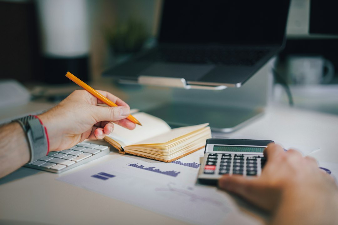 Illustrative investment paperwork, banknotes and calculator accompanying stock split, bonus shares and rights issue explanation